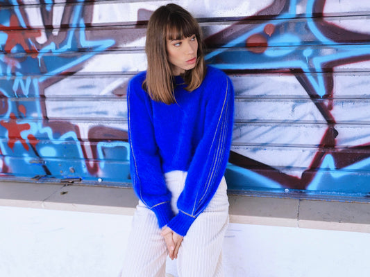 Pull Alix Angora bleu olympiade et doré.