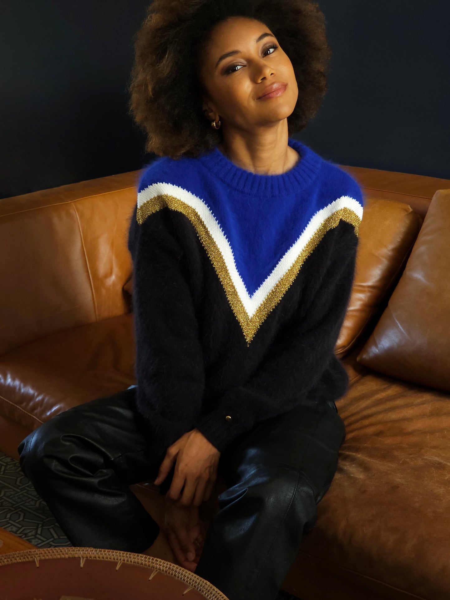 Pull Celeste bleu et noir.