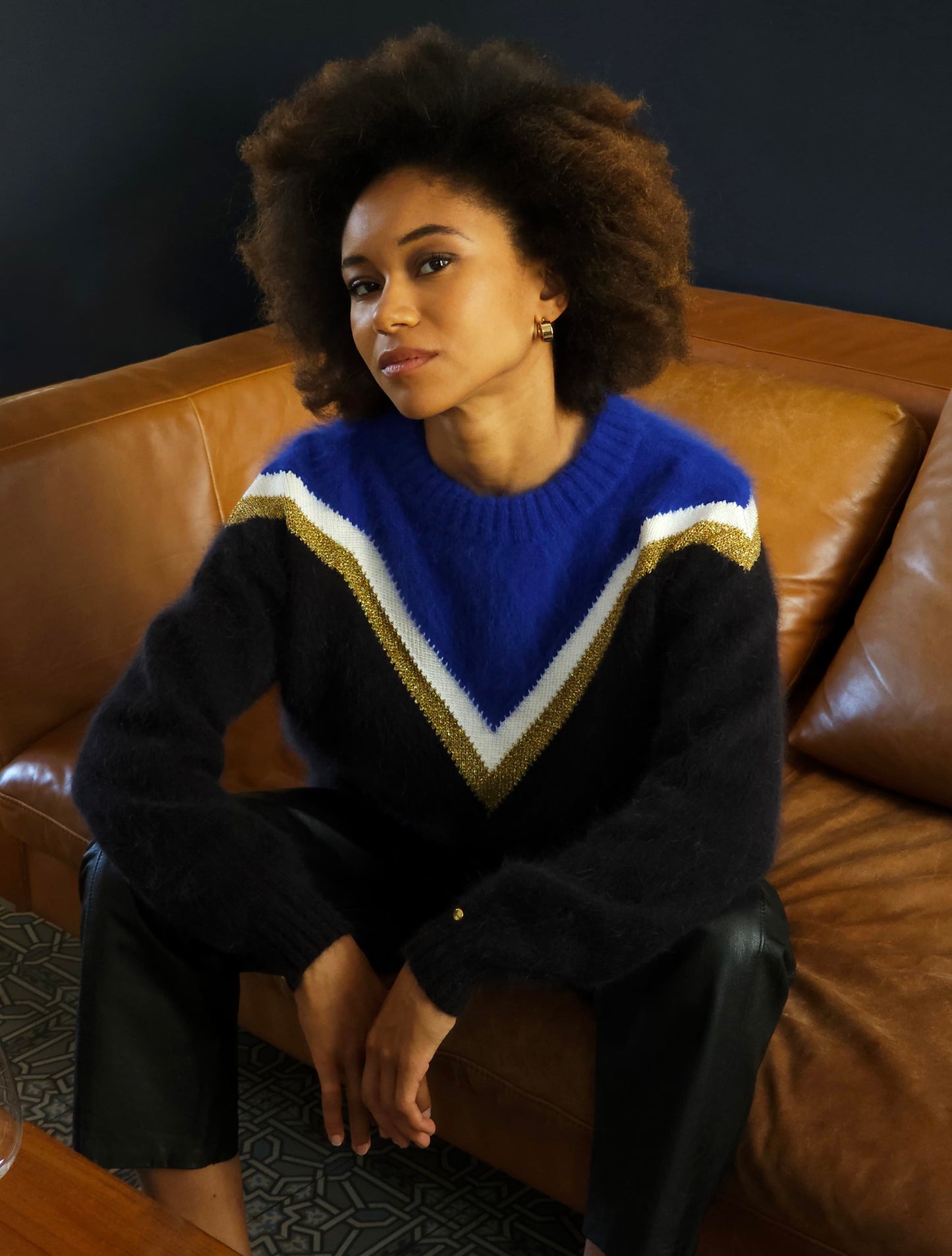 Pull Celeste bleu et noir.