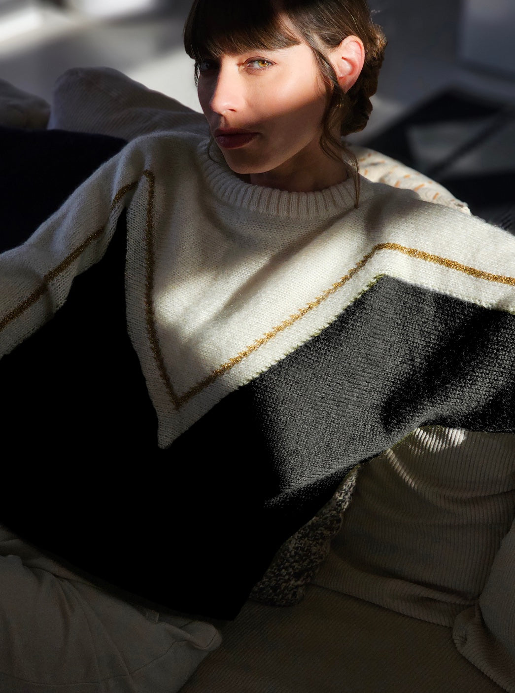 Pull Cyclone Noir et doré.