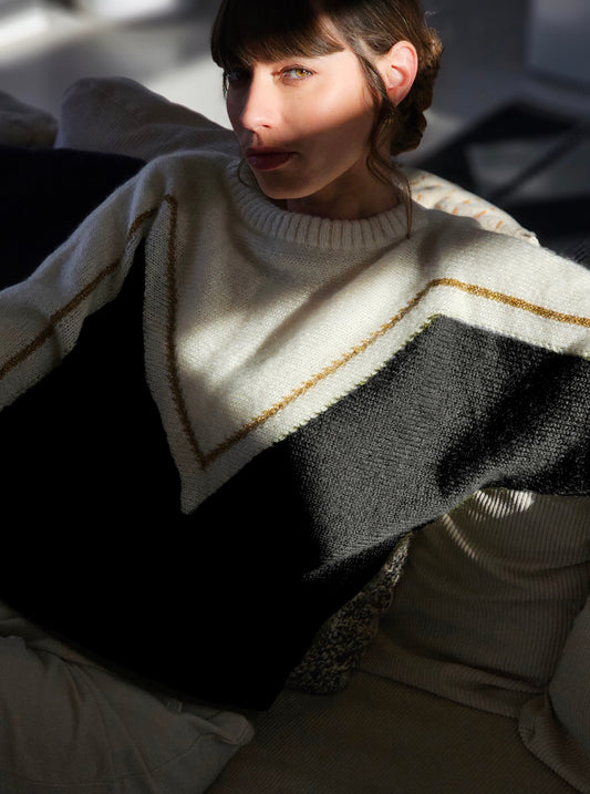 Pull Cyclone Noir et doré.