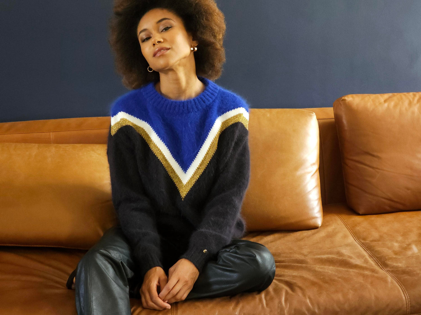 Pull Celeste bleu et noir.
