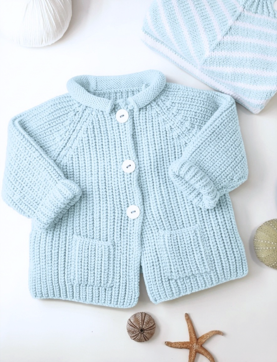 Veste bébé Acajou à tricoter.