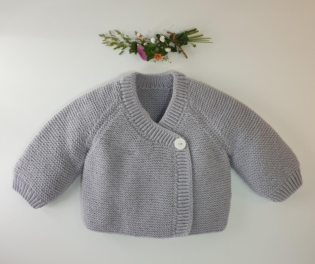 Cache-coeur bébé Myrte à tricoter