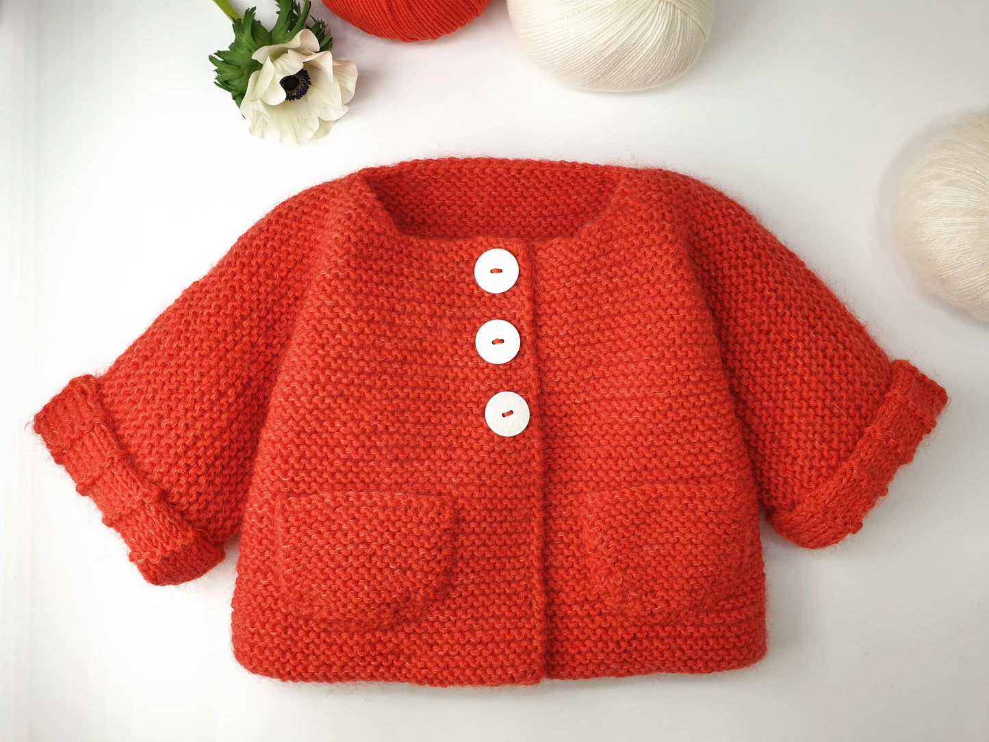 Manteau bébé Pin à tricoter.