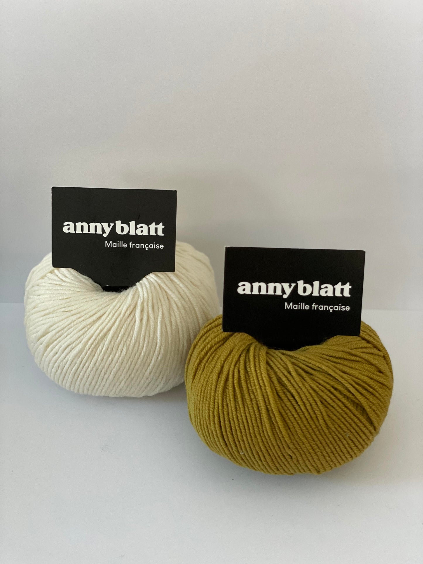 Modèle layette Mérinos naturel et oasis combinaison Hetre.jpg